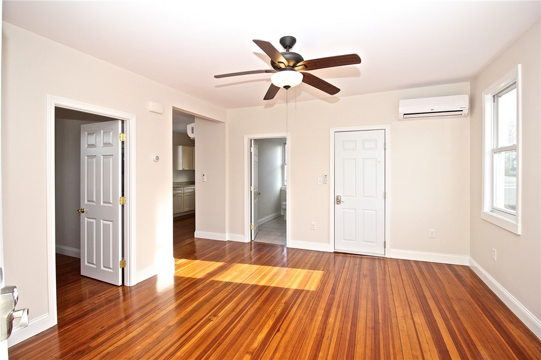 668 Thames Street, Unit 2 Newport, RI 02840 - Photo 12 of 42 Entry view to living room, bedroom 2, kitchen and full bath.