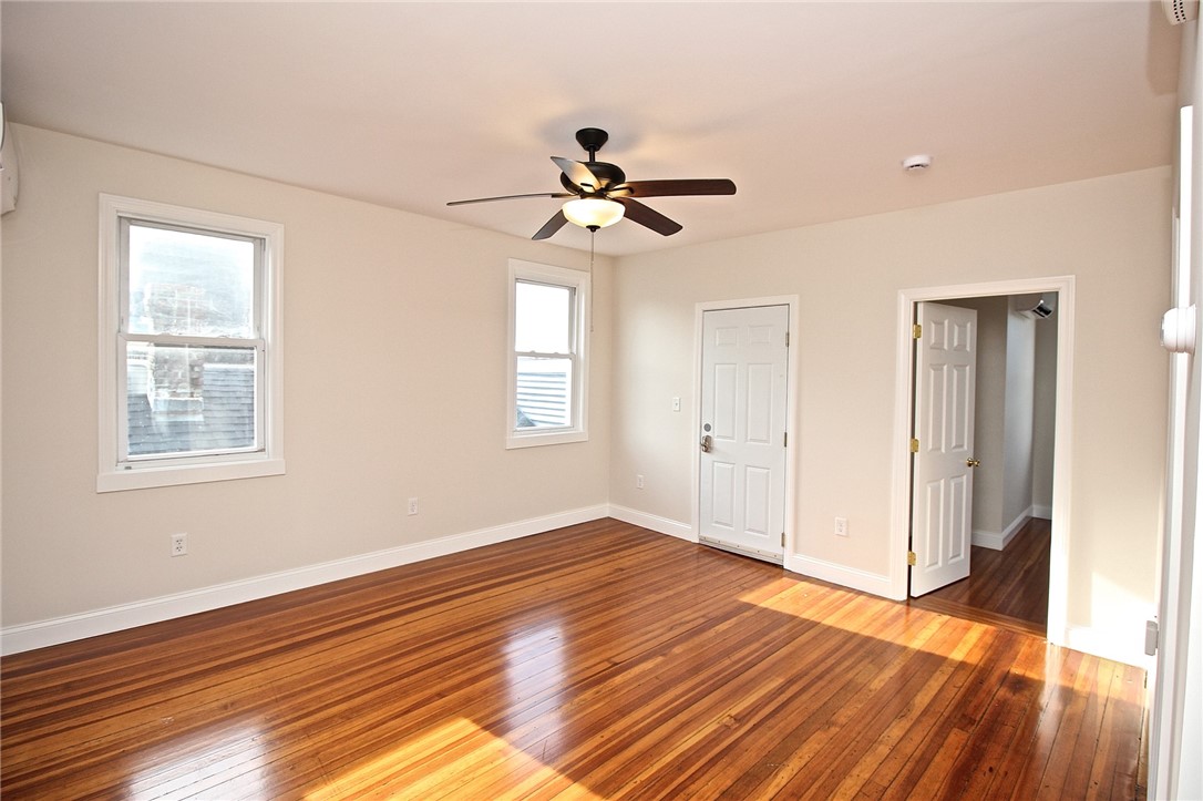 668 Thames Street, Unit 2 Newport, RI 02840 - Photo 20 of 42 View to living room , front door & bedroom 1 from Kitchen