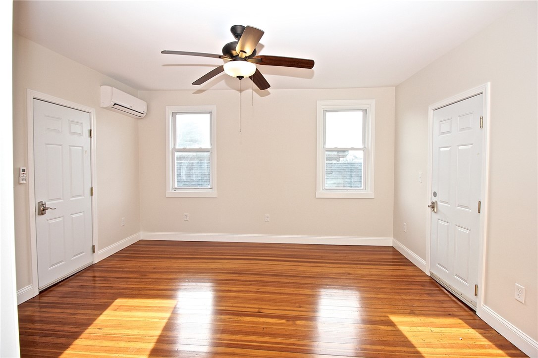 668 Thames Street, Unit 2 Newport, RI 02840 - Photo 30 of 42 Living room view to front and back doors