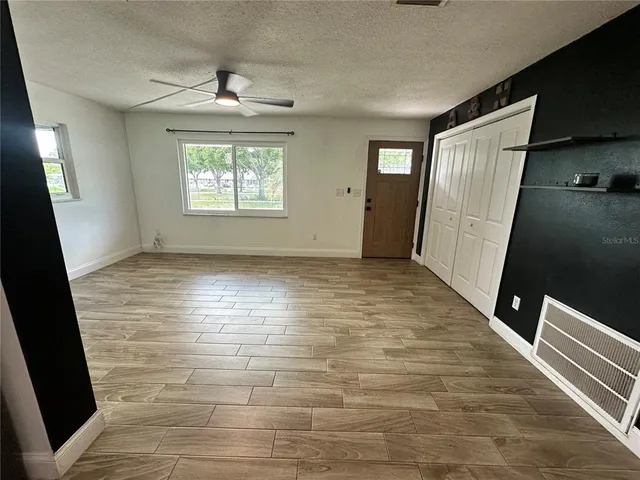 an empty room with windows