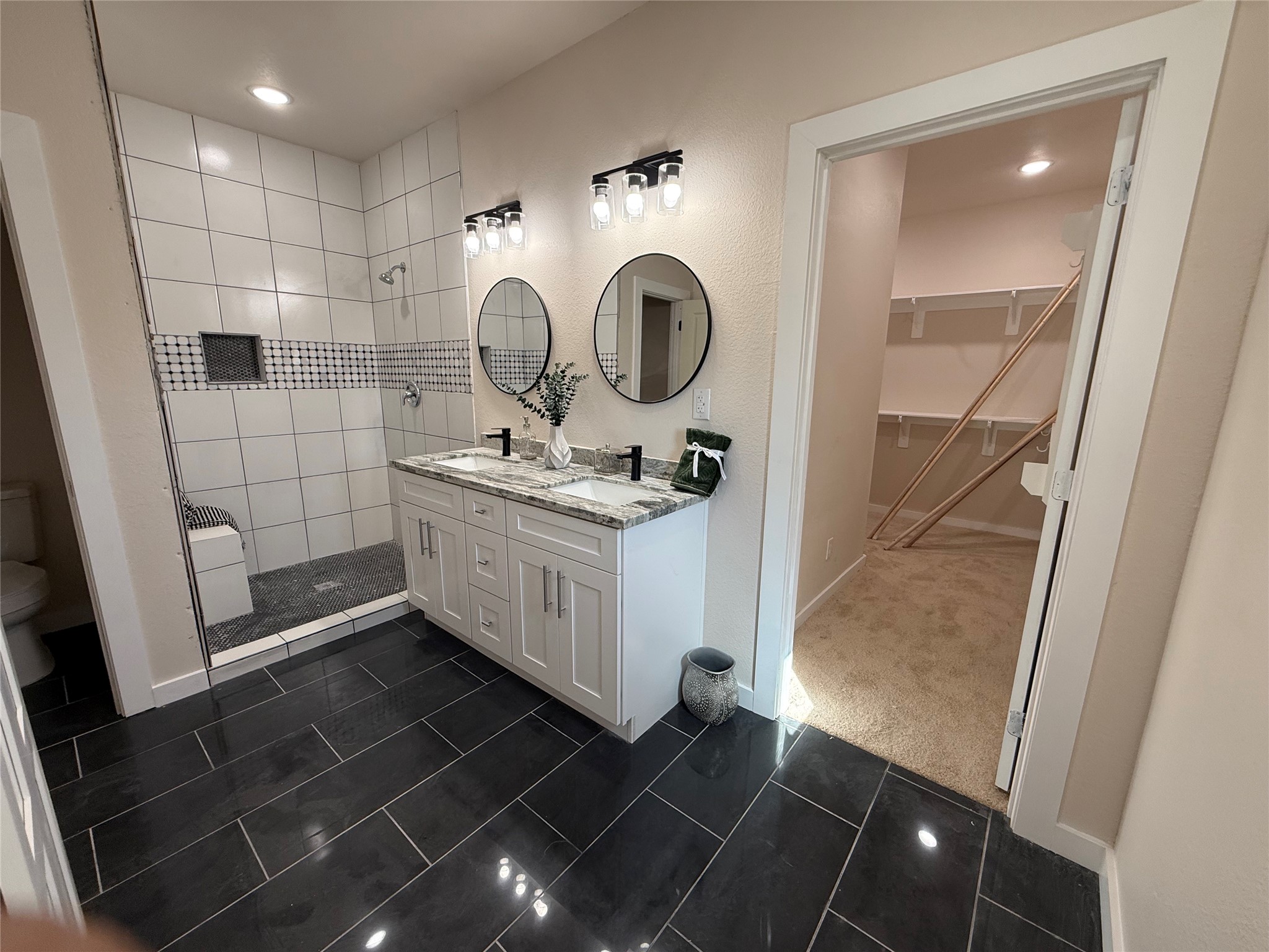 219 South 7th Street Beasley, TX 77417 - Photo 11 of 23 a bathroom with a sink and a mirror