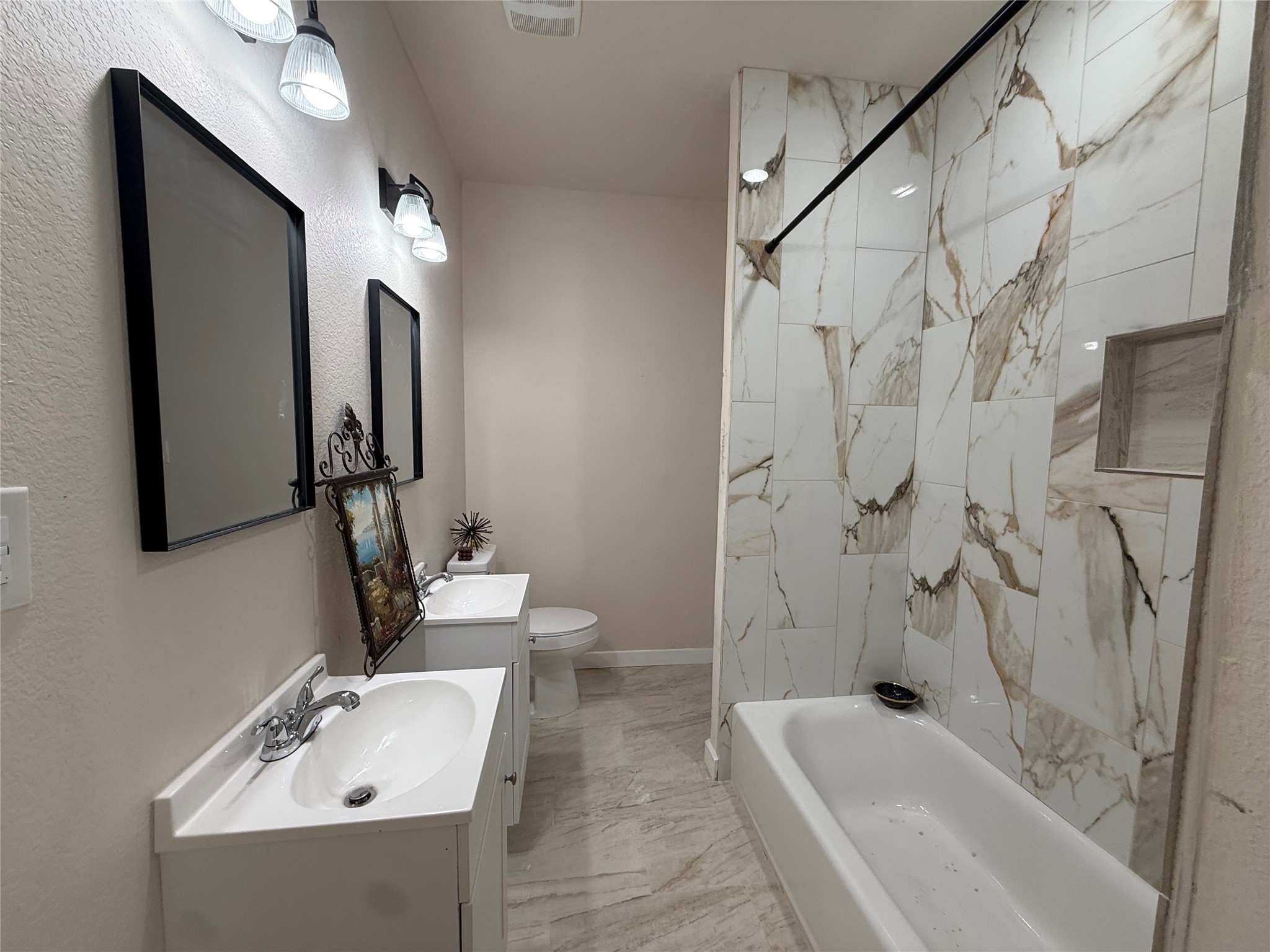 219 South 7th Street Beasley, TX 77417 - Photo 18 of 23 a bathroom with a sink a toilet and shower