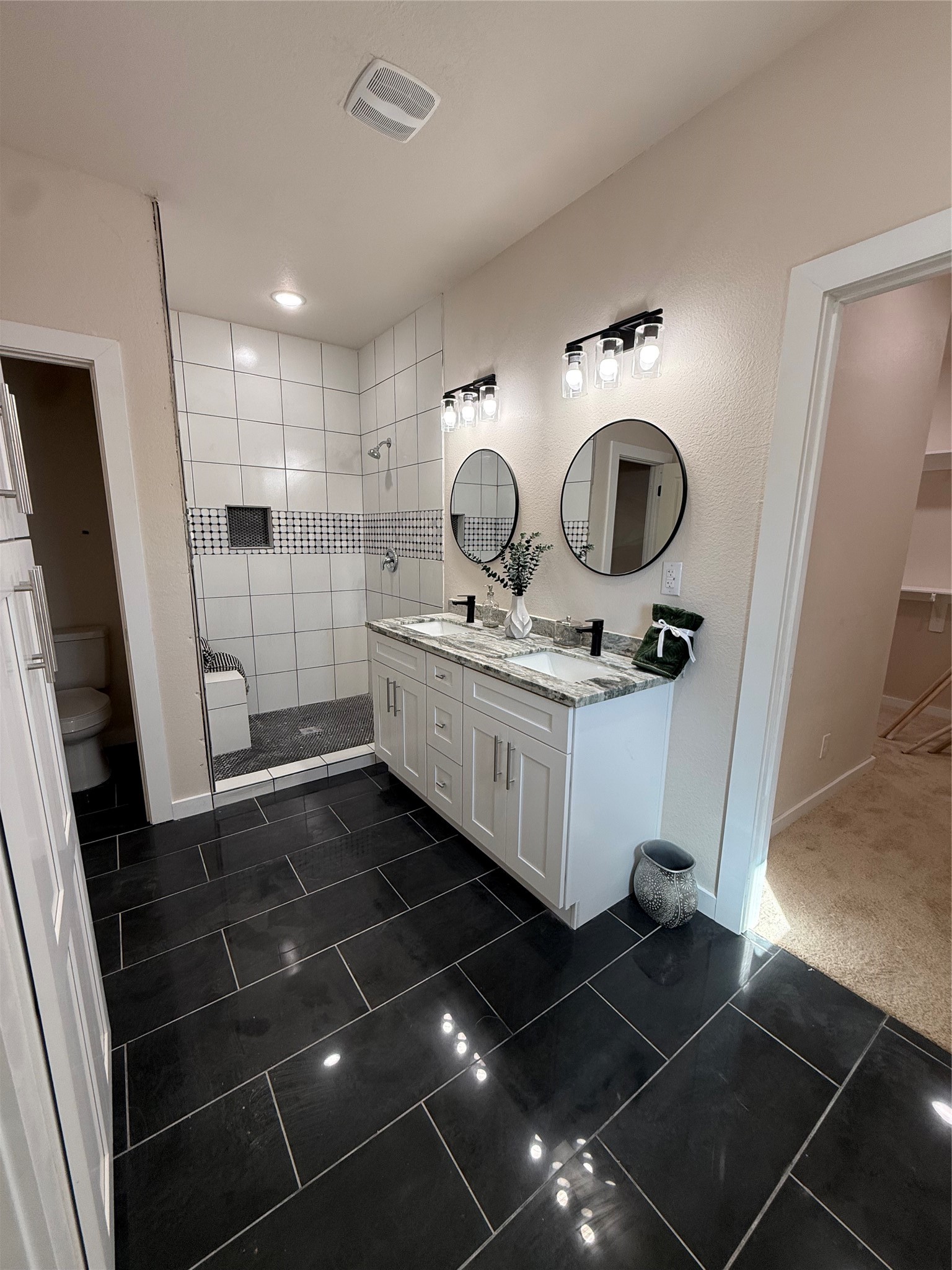 219 South 7th Street Beasley, TX 77417 - Photo 10 of 23 a bathroom with a sink a toilet and a mirror