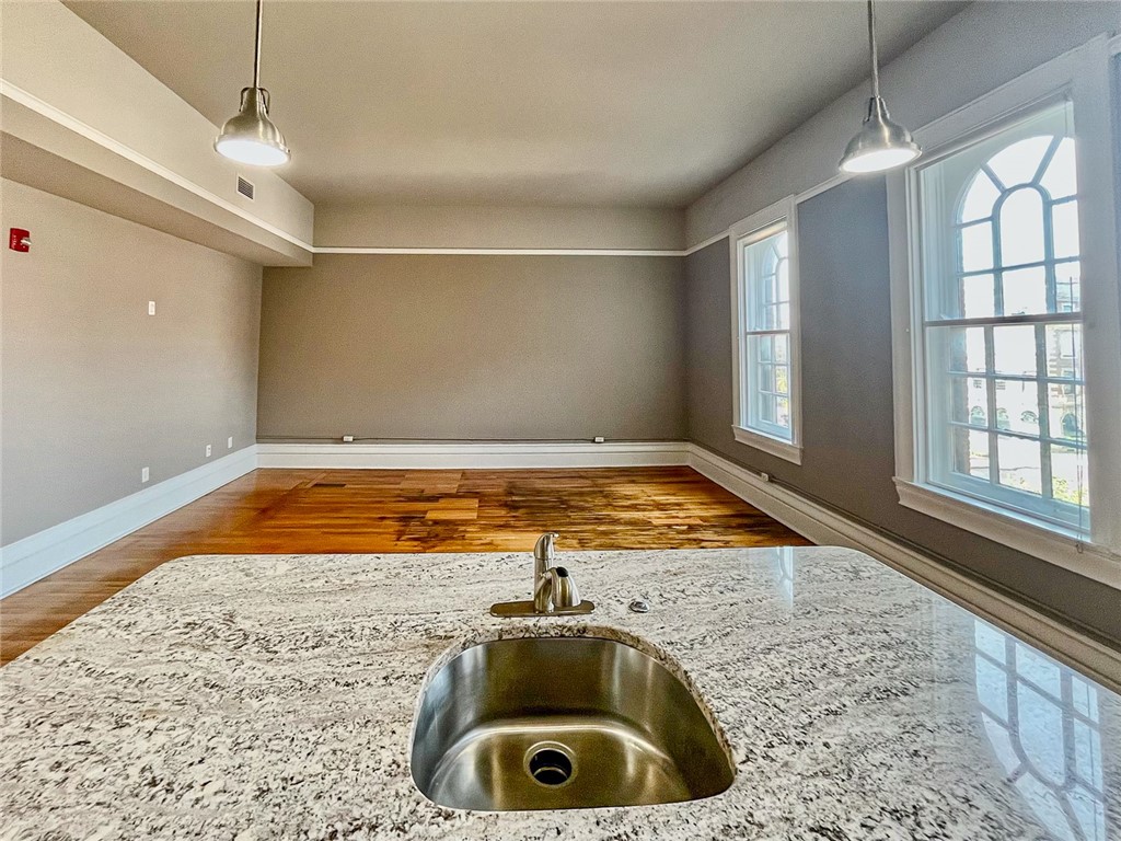 300 Alexander Street, Unit 103 Rochester, NY 14607 - Photo 2 of 7 Typical 4th floor Great Room with high ceilings, h