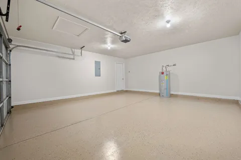 an empty room with a empty space and windows