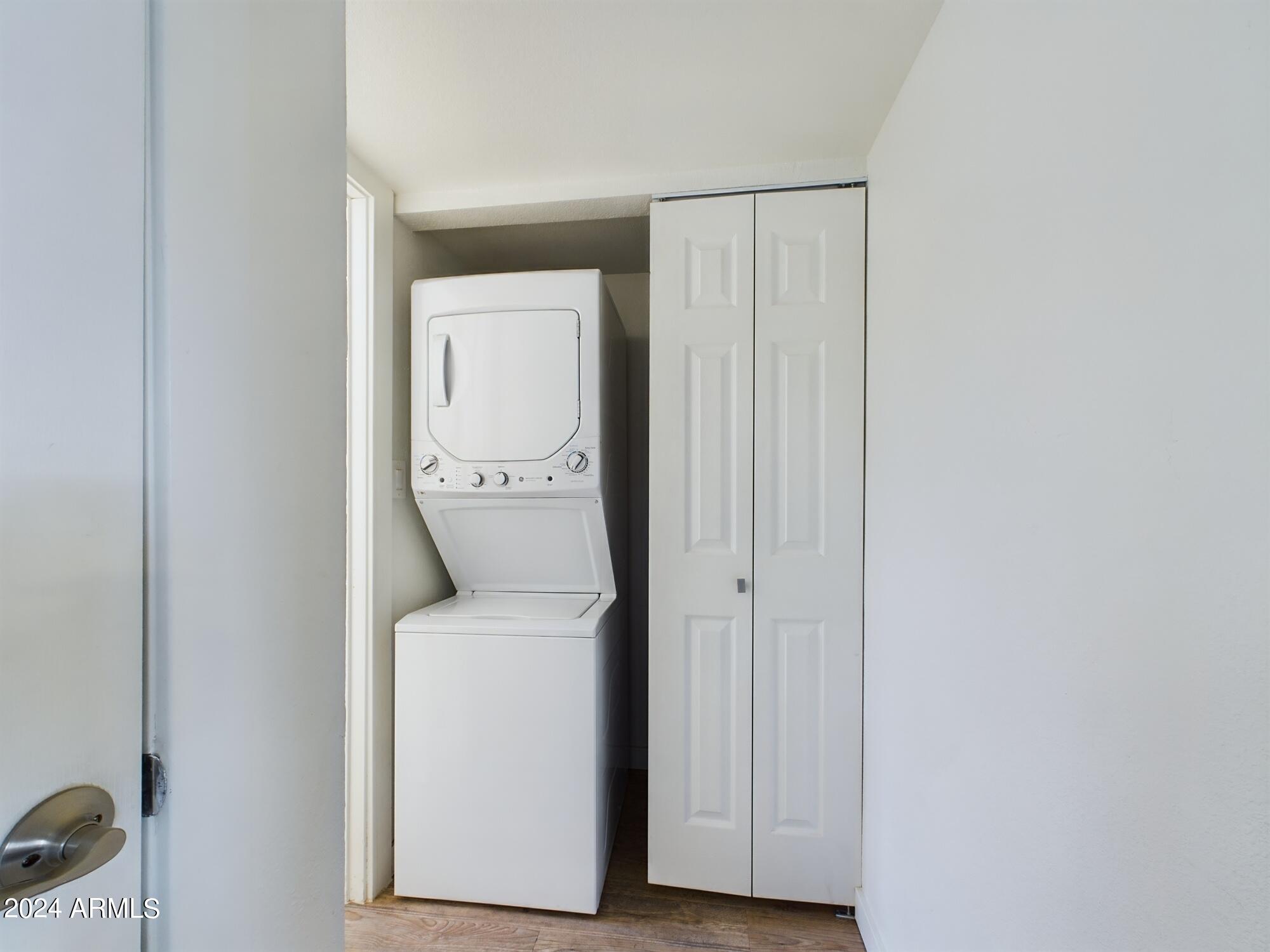 3027 North 37th Street, Unit 3 Phoenix, AZ 85018 - Photo 9 of 12 a utility room with a sink dryer and washer