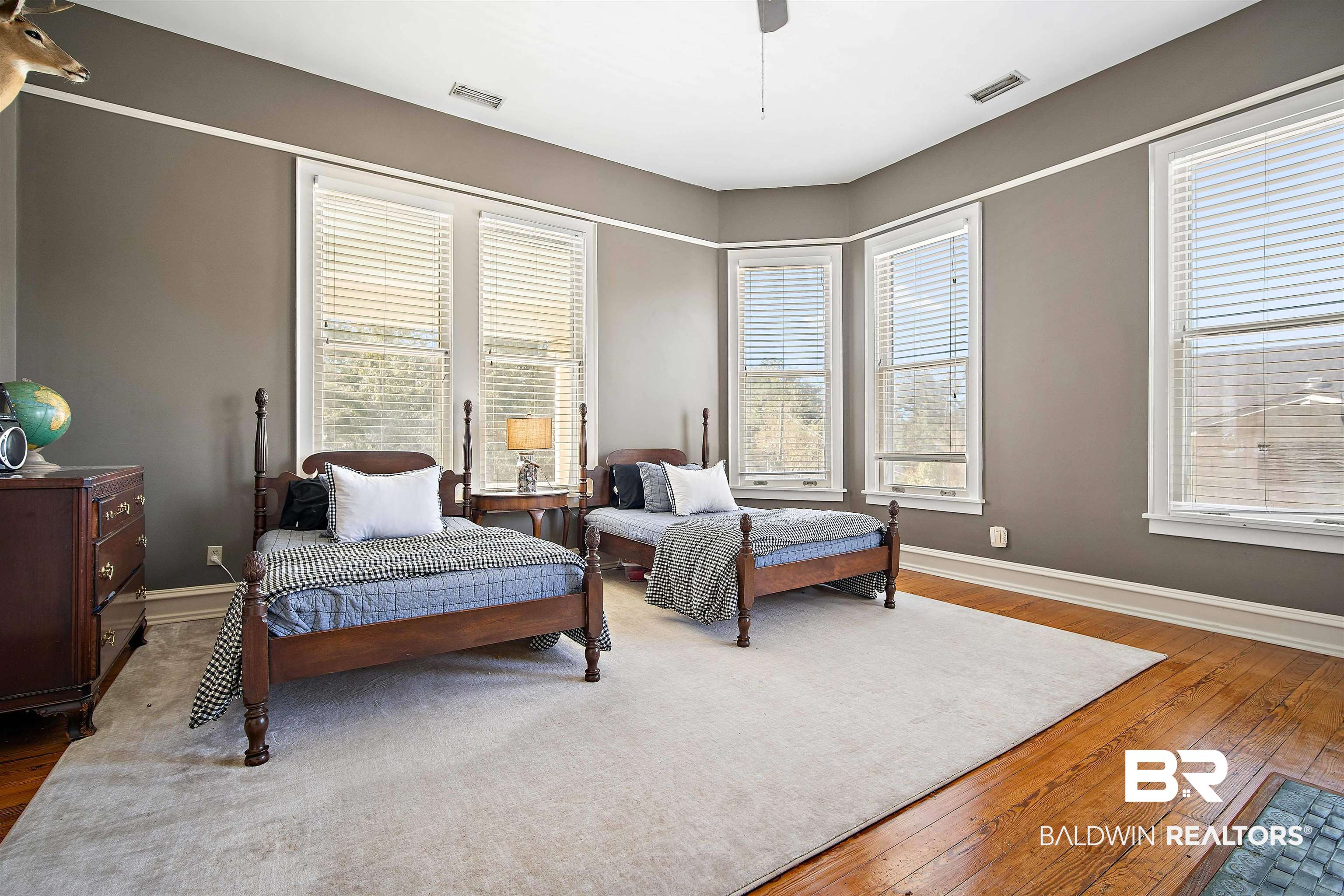 1314 Dauphin Street Mobile, AL 36604 - Photo 39 of 61 Bedroom featuring ceiling fan, hardwood flooring, and multiple windows