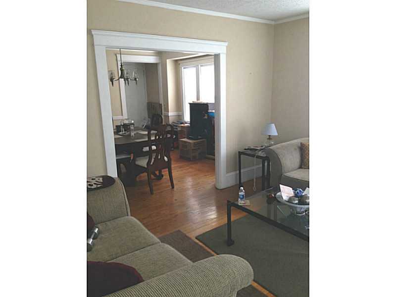 67 Friendly Road Cranston, RI 02910 - Photo 3 of 8 Dining Room. living room, dining room area all hardwood floors