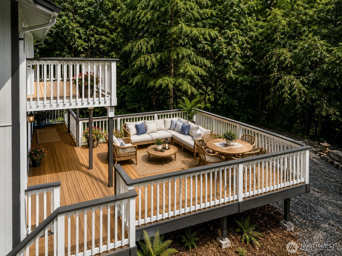 7605 Northeast Hidden Cove Road Bainbridge Island, WA 98110 - Photo 15 of 36 a view of balcony with wooden floor and fence