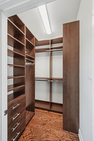 a view of an empty walk in closet