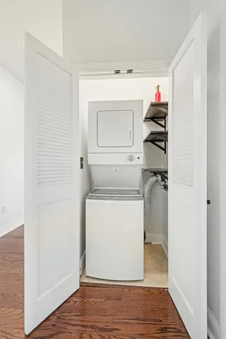 a view of a street with houses on both side