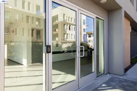 a view of a glass door of the house
