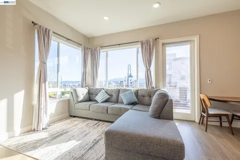 a workspace with furniture and a potted plant