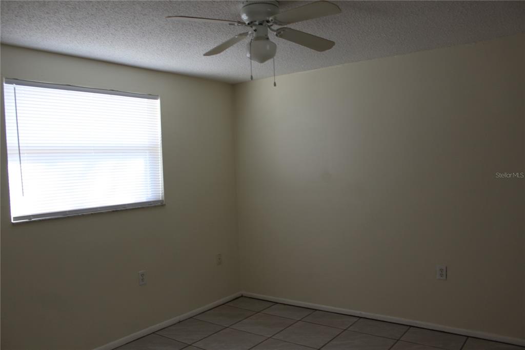 7414 Potomac Drive Port Richey, FL 34668 - Photo 12 of 18 an empty room with a window