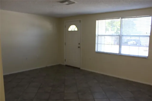 an empty room with a window