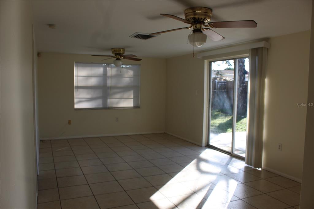 7414 Potomac Drive Port Richey, FL 34668 - Photo 6 of 18 a view of an empty room with a window