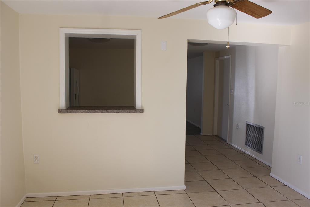 7414 Potomac Drive Port Richey, FL 34668 - Photo 7 of 18 wooden floor in an empty room