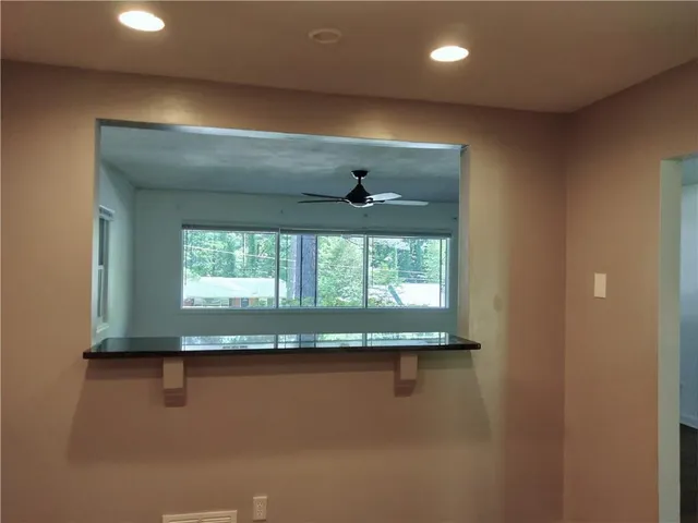 a bathroom with a sink and mirror