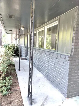 a view of porch with patio