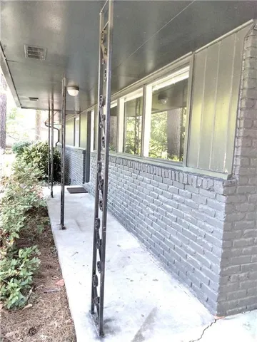 a view of porch with patio