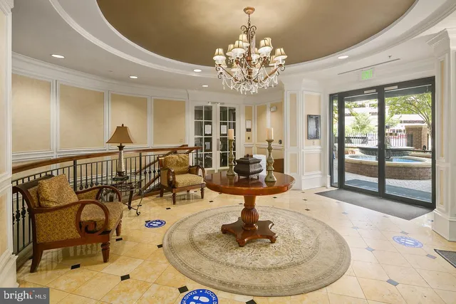 a view of a livingroom with furniture window and wooden floor