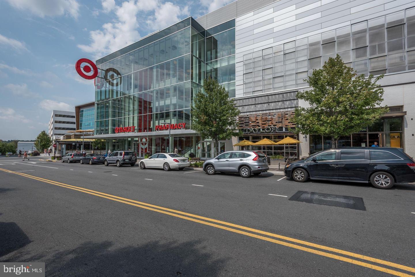 2655 Prosperity Avenue, Unit 108 Fairfax, VA 22031 - Photo 37 of 47 a car parked in front of a building