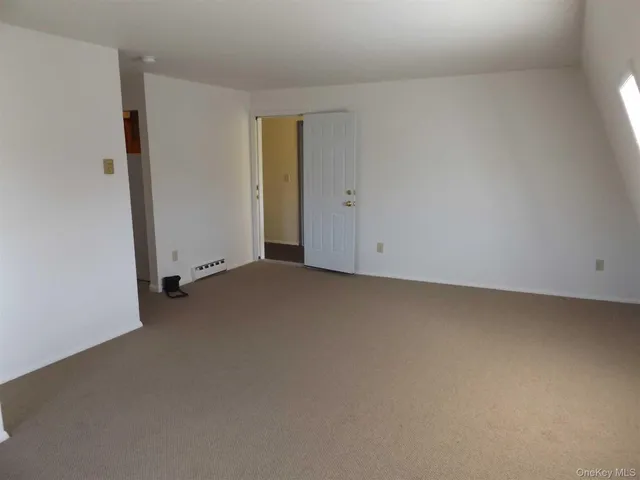 an empty room with an entryway