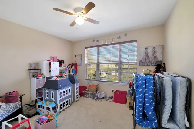 a bedroom with furniture and a bed