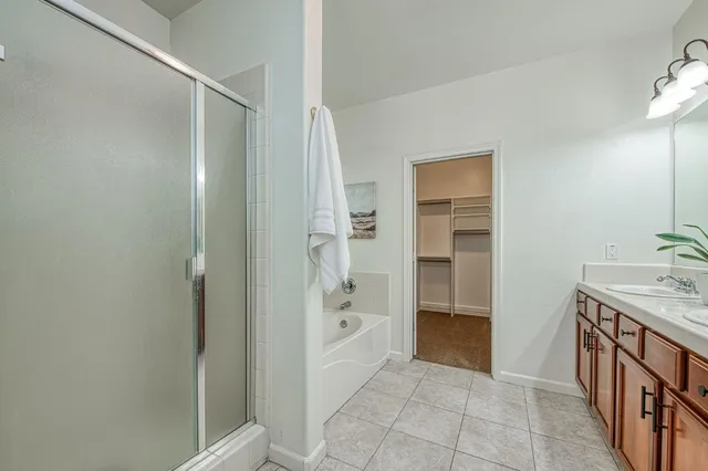 a bathroom with a sink and a shower