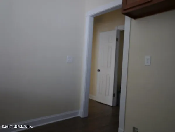 a view of hallway with closet