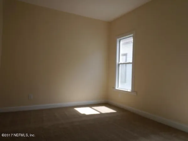 an empty room with a window