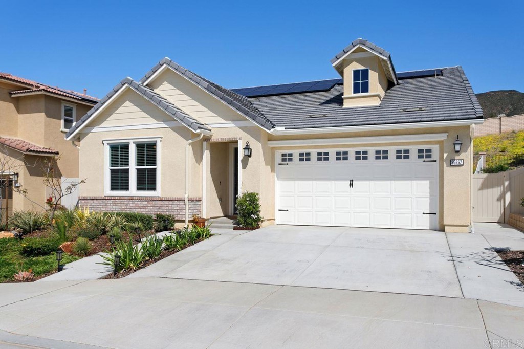 35767 Garrano Lane Fallbrook, CA 92028 - Photo 1 of 1 a front view of a house with garage