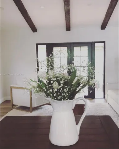 a vase of flowers sitting on a table