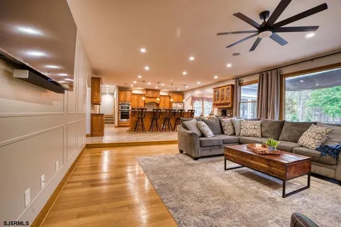 a bedroom with furniture and a fireplace