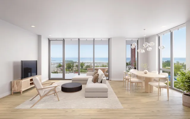 a living room with furniture large windows and flat screen tv