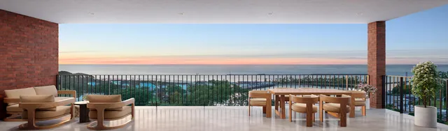 a view of balcony with furniture