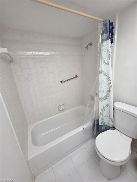 160 Turtle Lake Court, Unit 209 Naples, FL 34105 - Photo 15 of 26 a bathroom with a toilet and a bathtub