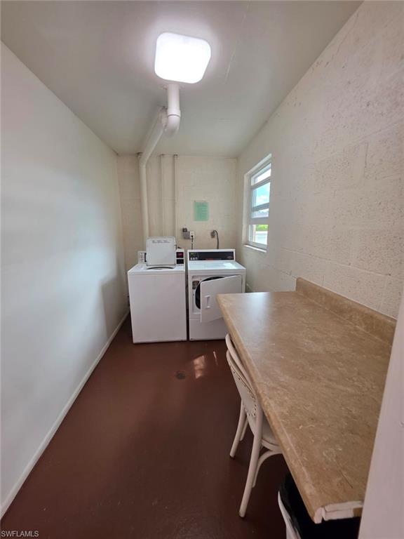 160 Turtle Lake Court, Unit 209 Naples, FL 34105 - Photo 17 of 26 a living room with furniture and a table