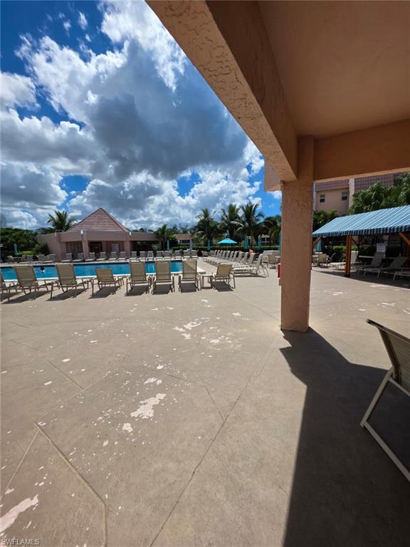 160 Turtle Lake Court, Unit 209 Naples, FL 34105 - Photo 26 of 26 a outdoor space with lots of buildings