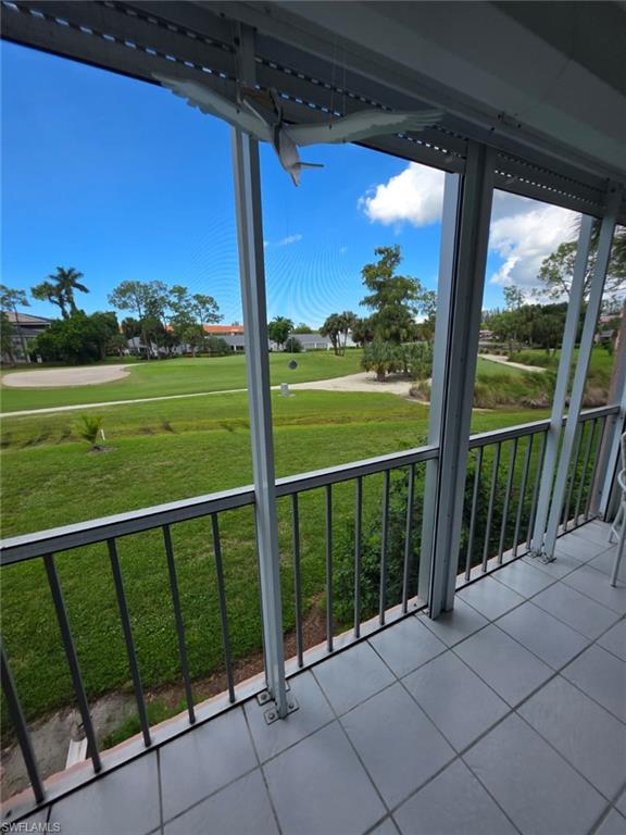 160 Turtle Lake Court, Unit 209 Naples, FL 34105 - Photo 4 of 26 a view of a balcony with an outdoor space