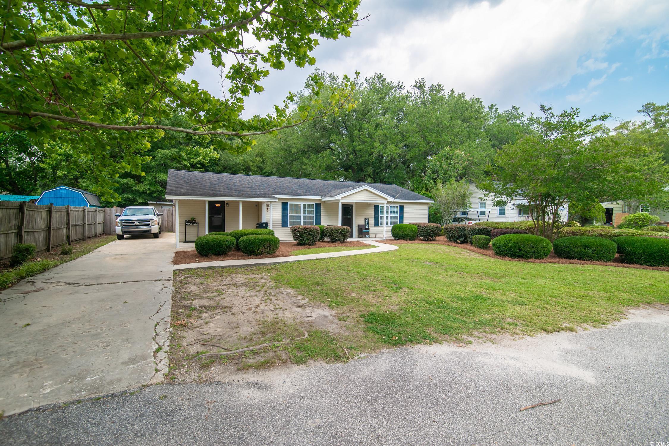 2510 Redwood Street Georgetown, SC 29440 - Photo 2 of 27 Single story home featuring concrete driveway and a porch