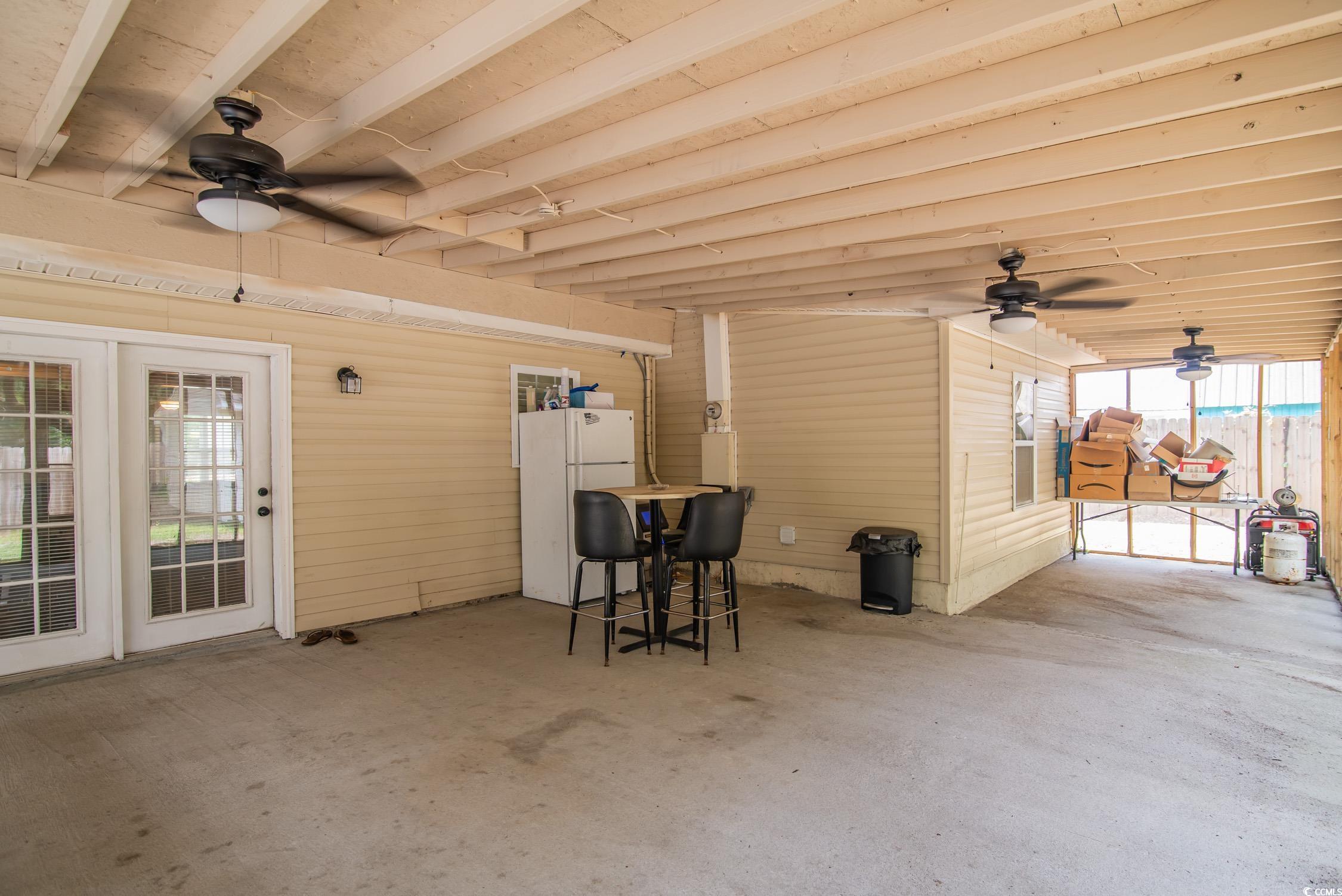 2510 Redwood Street Georgetown, SC 29440 - Photo 23 of 27 Sunroom / solarium featuring ceiling fan and french doors
