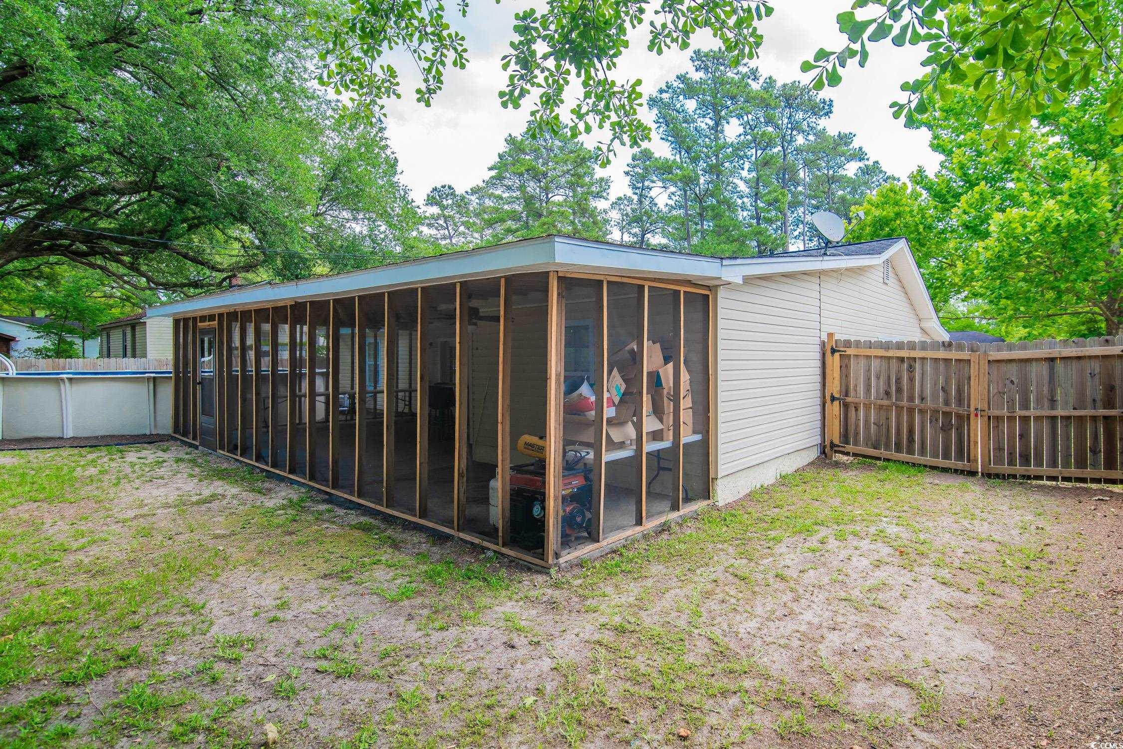 2510 Redwood Street Georgetown, SC 29440 - Photo 25 of 27 Sunroom with ceiling fan