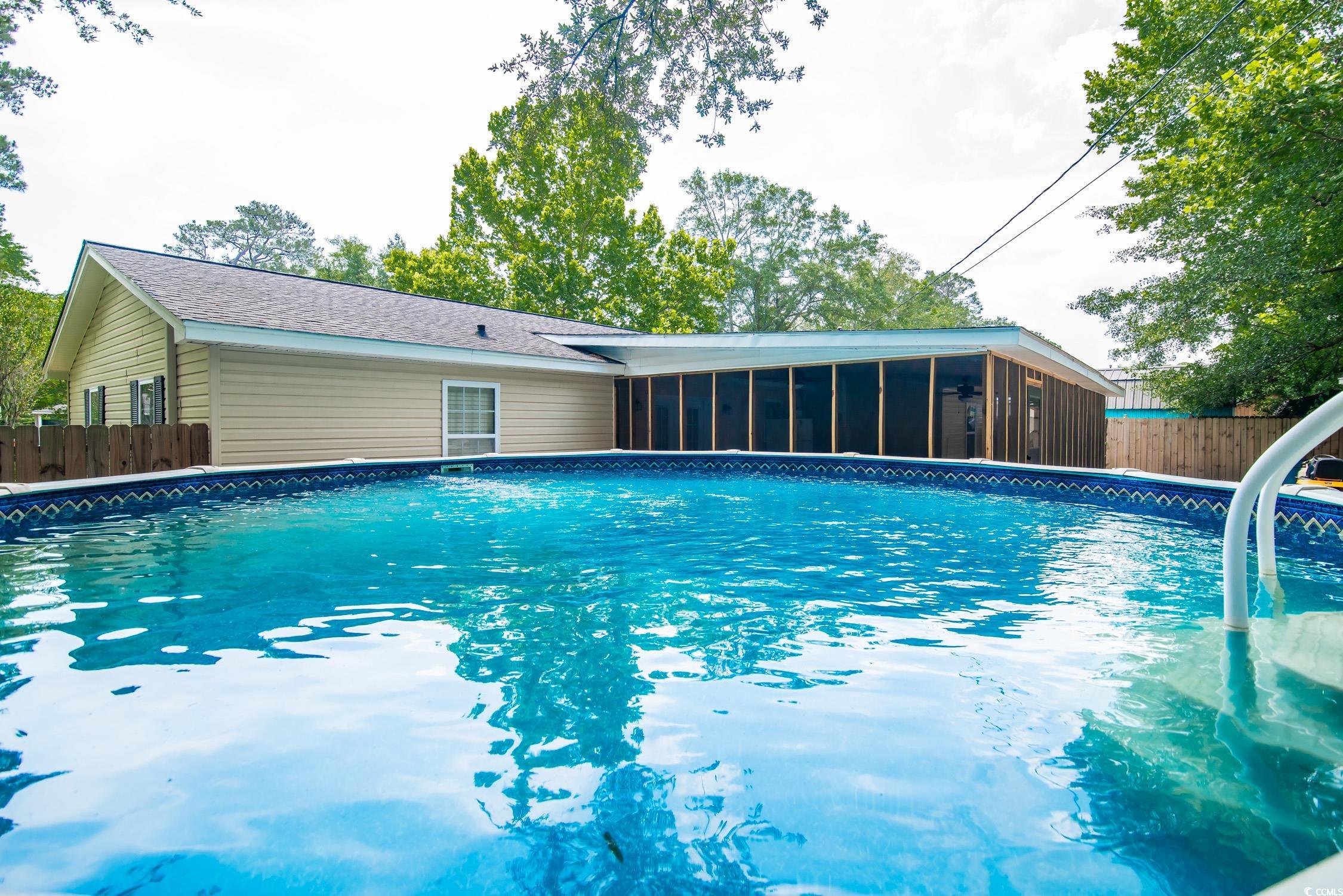 2510 Redwood Street Georgetown, SC 29440 - Photo 27 of 27 Exterior space featuring a sunroom