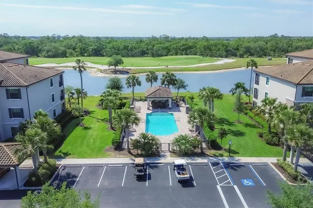 a view of a lake with a building in the background
