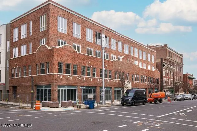 a front view of a building with street