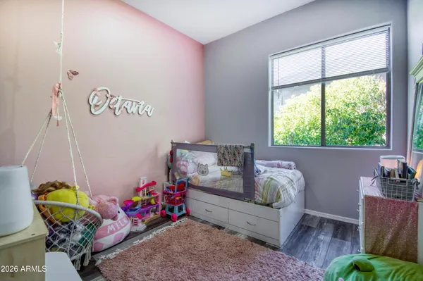 a bedroom with furniture and a bed