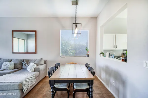 a bedroom with bed and a window