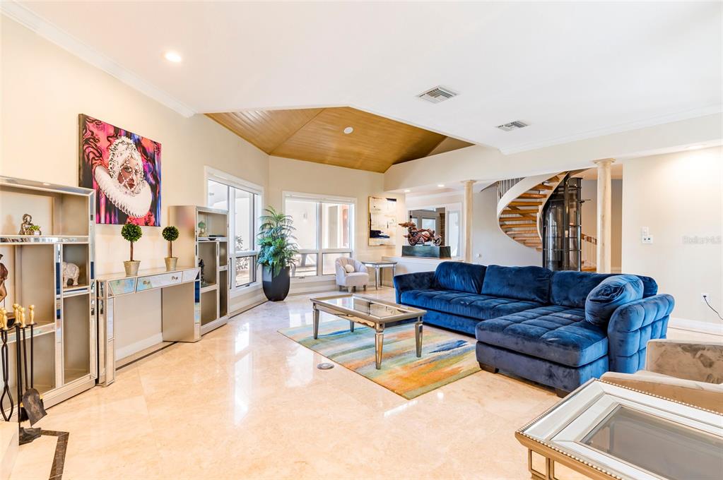 2268 Kings Point Drive Largo, FL 33774 - Photo 15 of 84 a living room with furniture and kitchen view