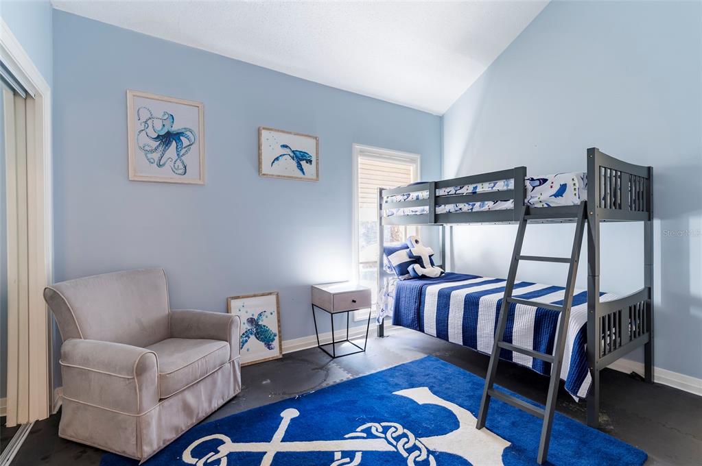 2268 Kings Point Drive Largo, FL 33774 - Photo 21 of 84 a living room with furniture and wooden floor